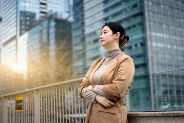 Confident Professional Woman Overlooking the City