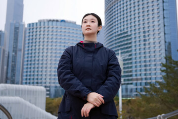 Confident Professional Woman in a Modern Cityscape