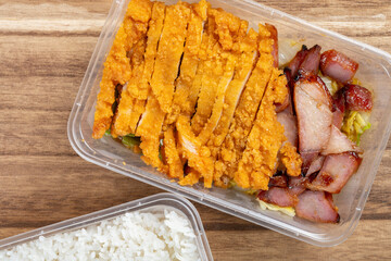 top view fast food with chicken cutlets and bbq porks and rice at horizontal composition