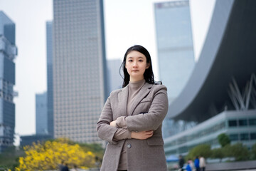 Confident Young Woman in Urban Business District