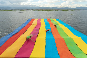 Colorful fabric in Inle, Myanmar. Clothes material for design decoration background. Handcraft