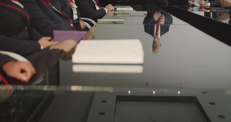 Large group of senior managers having a meeting at the meeting room office, senior managers developing a strategy, CEO giving standing speech - Powered by Adobe