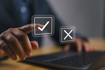 Select the check mark on a laptop. check right and wrong marks. concept decide to choose vote. yes or no decisions, and business options for difficult situations in dilemma. - obrazy, fototapety, plakaty