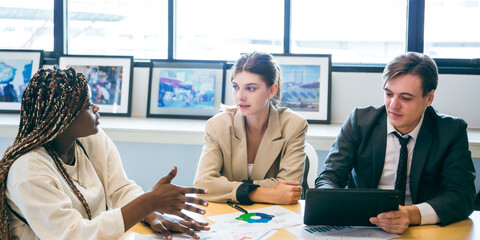 business team meeting with stats and review graphs of company target, goals or market research with data analysis. Above, table or paperwork report of growth, progress or startup performance analytics