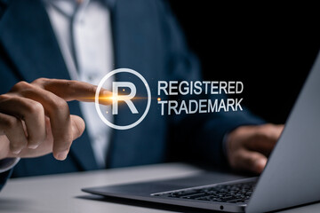 Copyright protection concept. Registration or registration for trademark. Businessman using laptop...