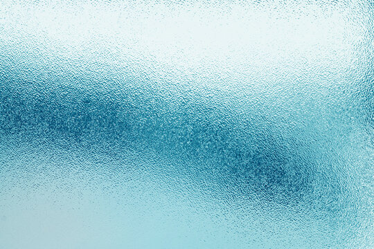 Close-up of frosted blue glass texture background