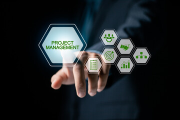 Project management concept, Planning the successful and efficient implementation of the project in the specified time period. Businessman touching project management icon on virtual screen.