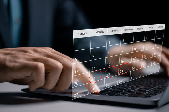 Businessman use laptop to manage time for effective work. Highlight appointment reminders and meeting agenda on calendar, Calendar on virtual screen. Time management concept.