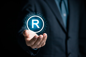 Copyright protection concept. Registration or registration for trademark. Businessman holding...