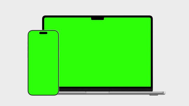 HD animation of moving smartphone and laptop mockups..Green background for chroma key on the smartphone screen. used for commercials and app presentations
