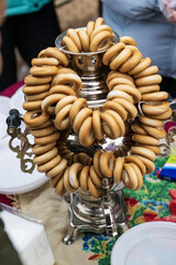 bagels are hanging on the samovar