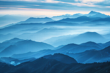 Obraz premium a view of a mountain range with a few clouds