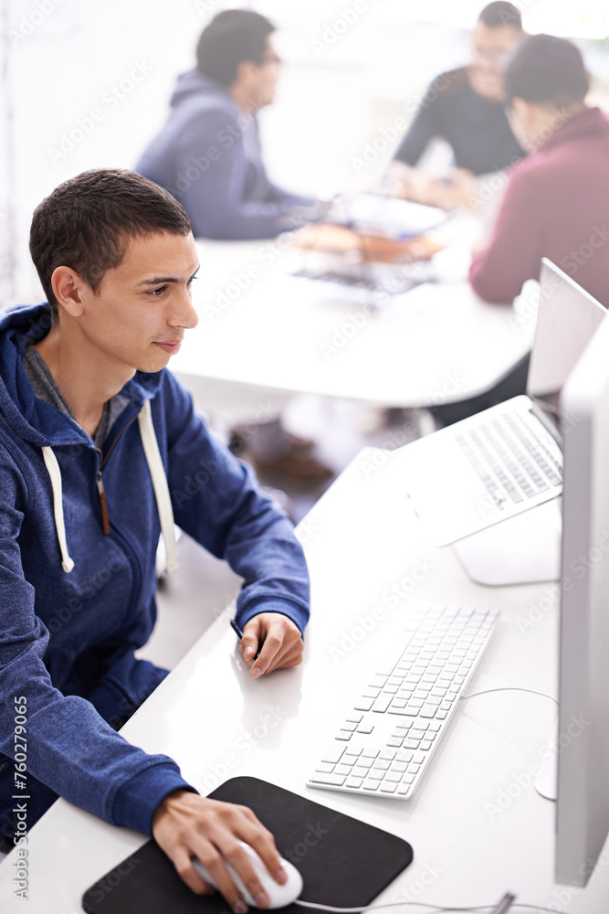 Poster Young man, computer and working at office desk for web development, programming or information technology. Business programmer, worker or online designer on multimedia, planning and startup project