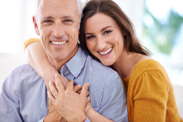 Couple, age difference and hug for love with unique relationship, portrait and support for trust at home. Senior man, young woman and marriage, commitment and loyalty with partner and pride together