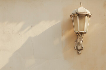 a street light on a wall with a shadow