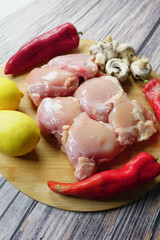 top view of raw breast chicken meat and vegetables on table 