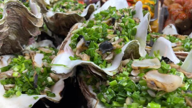 Street food at night in Phu Quoc island in Vietnam Delicious seafood for tourist at market