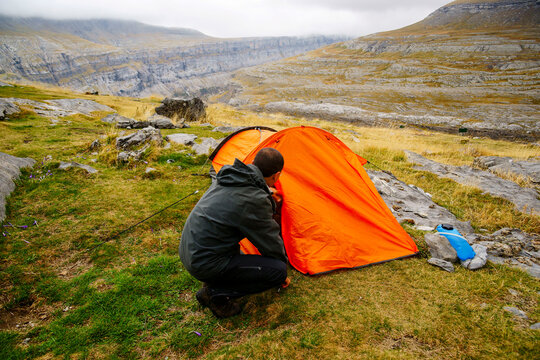 hikers preparing the tent, refuge of Goriz. Valley of Ordesa.Huesca.Pyrenean mountain range.Espa&ntilde;a.
