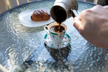 Armenian - Turkish coffee from traditional coffee pot jazzve - cezve and a French chocolate...