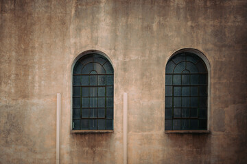 Old windows and concrete wall