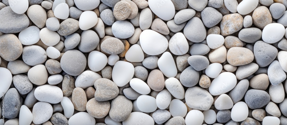 Poster texture and patterns: serene close-up of multicolored pebbles in natural light