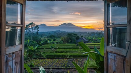 Window to fields and mountains at sunset View from the hotel window on the northern part of the island.