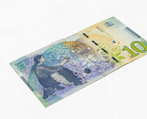 Ten  Lari banknote of the National Bank of Georgia on a white background