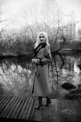 Portrait of a young beautiful blonde girl outdoors.