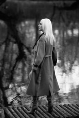 Portrait of a young beautiful blonde girl outdoors.