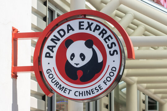 Portland, OR, USA - May 17, 2023: Closeup of the Panda Express sign seen outside one of its restaurants in Portland, Oregon. Panda Express is a fast food chain specializing in American Chinese food.
