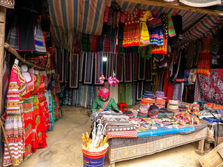 Hill Tribe Woman Pulling a Thread Embroidered in The Cat Cat Village