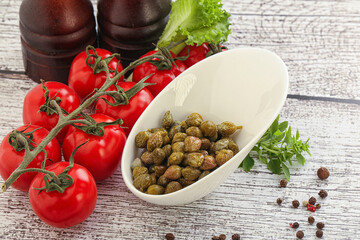 Marinated green capers in the bowl