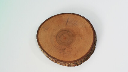top view of circular wood piece with annual ring isolated float in air on white background for mockup