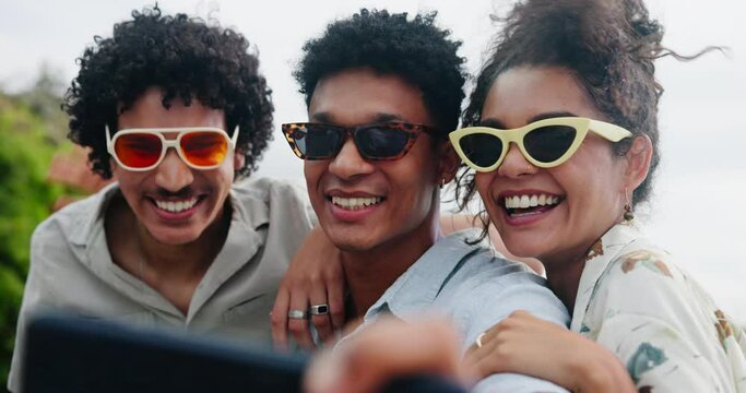 Friends, sunglasses and group selfie with smile for outdoor photography, fashion and social media with emoji face. Excited, gen z or people in cool accessories and profile picture at the park or city