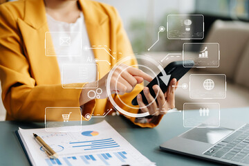 Digital marketing media in virtual screen.businesswoman hand working with mobile phone and modern...