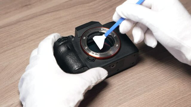 Cleaning a modern digital full-frame camera sensor using a sensor swab