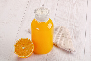 Sweet fresh orange juice in the glass