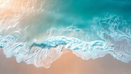Aerial shot of a gentle turquoise ocean meeting a sandy beach with soft waves, evoking a serene, tranquil vibe perfect for summer or travel themes.