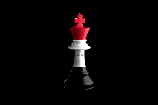 Iraq flags paint over on chess king. 3D illustration.