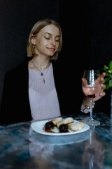 woman in restaurant with champagne