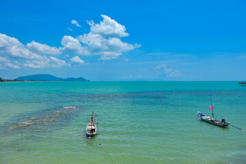 Long tail boat in the sea, Beautiful sea clear water, relaxing in your holiday at Khanom beach...