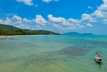Long tail boat in the sea, Beautiful sea clear water, relaxing in your holiday at Khanom beach...