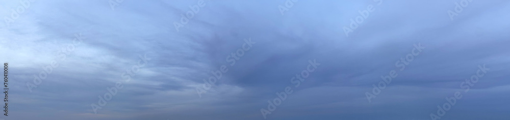 Wall mural beautiful dark blue nightly cloudy sky background