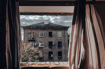 destroyed and burned houses in the city during the war in Ukraine