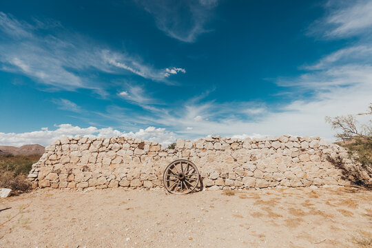 Wagon Wheel Resting on Ancient Ruins in Hueco Tanks State Park