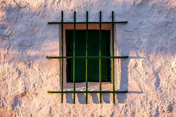 Green window at sunset in Alhambra