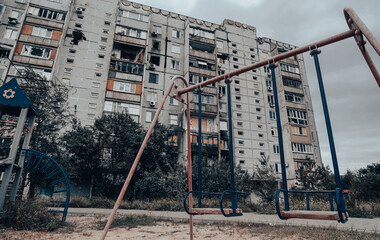 destroyed and burned houses in the city during the war in Ukraine