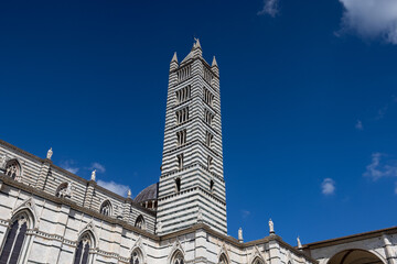 The striped romanesque bell tower of Siena Cathedral. Tuscany, I