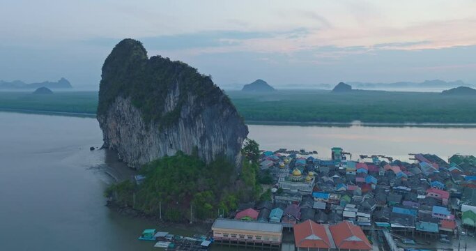 Aerial view Imagine a beautiful bright sky at sunrise.The flare light from the sun shines down on the islands. .stunning aerial view of the beautiful Phang Nga Bay