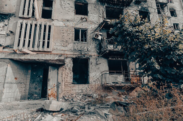 destroyed and burned houses in the city during the war in Ukraine
